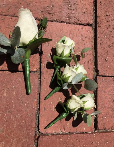 Whire rose buttonholes